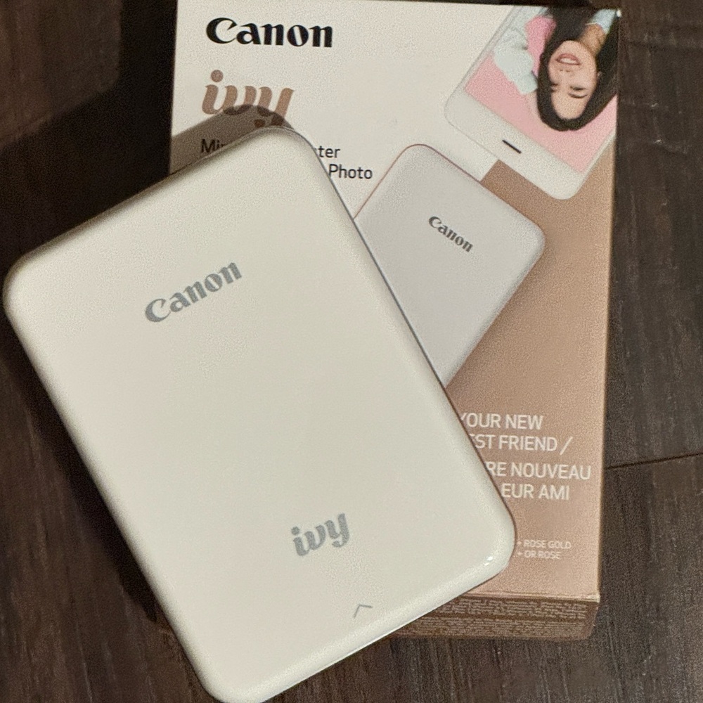 Canon IVY Mini Printer in Rose Gold and White. Uses ZINK 2x3 Photo Sticker Paper